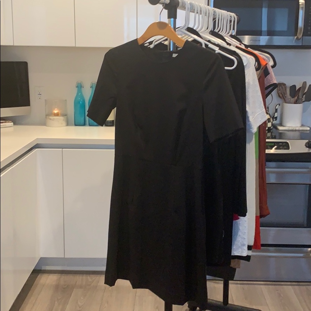 Black dress, perfect for office look.